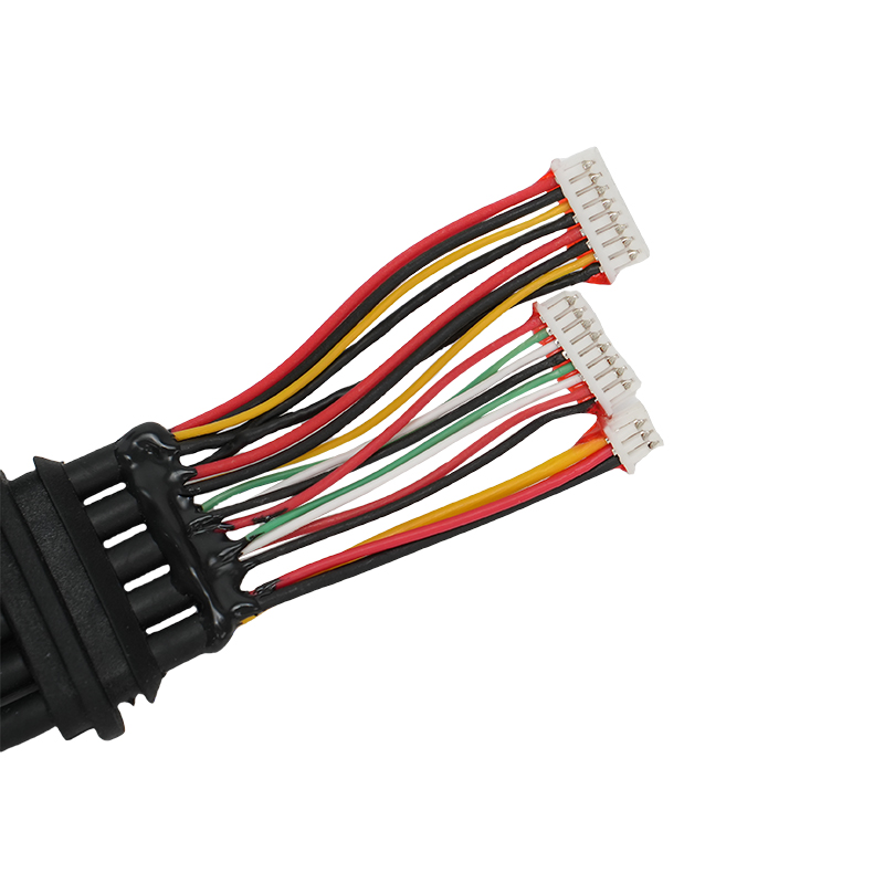 How does the shielding structure of a motorcycle camera cable affect its electromagnetic interference suppression effect?